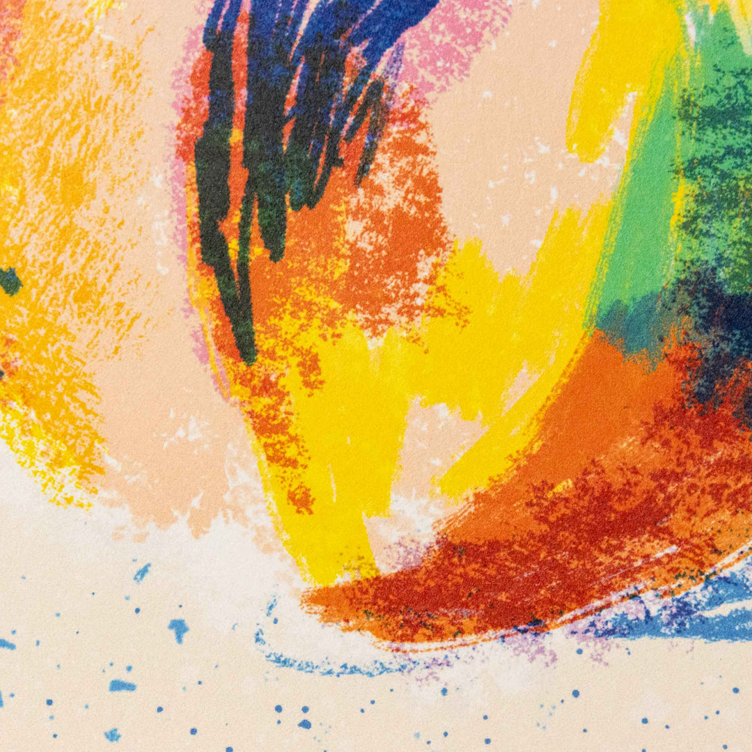 A close-up of an abstract painting with vibrant brushstrokes of yellow, orange, green, and blue on a beige background, featuring paint splatters and varied textures.